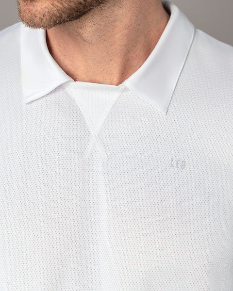Camiseta deportiva transpirable con cuello tipo polo#color_000-blanco