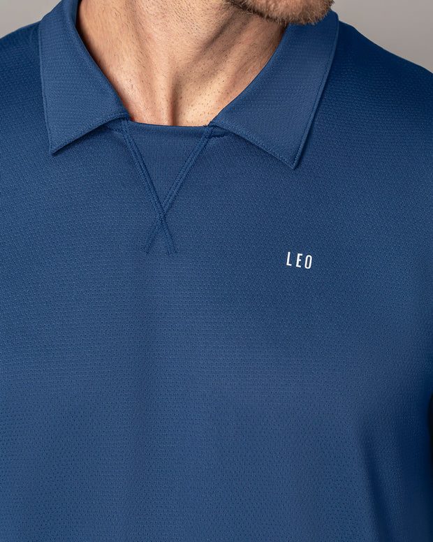 Camiseta deportiva transpirable con cuello tipo polo