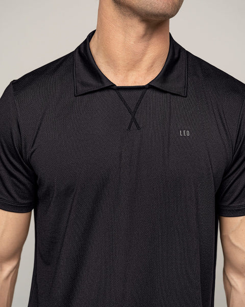 Camiseta deportiva transpirable con cuello tipo polo#color_700-negro