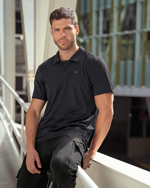 Camiseta deportiva transpirable con cuello tipo polo#color_700-negro