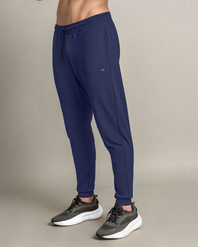 Jogger deportivo estilo sudadera con bolsillos laterales funcionales#color_509-azul-oscuro