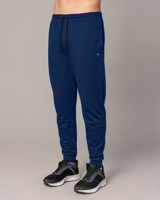 Jogger deportivo estilo sudadera con bolsillos laterales funcionales#color_559-azul-oscuro
