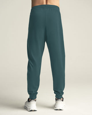 Jogger deportivo estilo sudadera con bolsillos laterales funcionales#color_678-verde