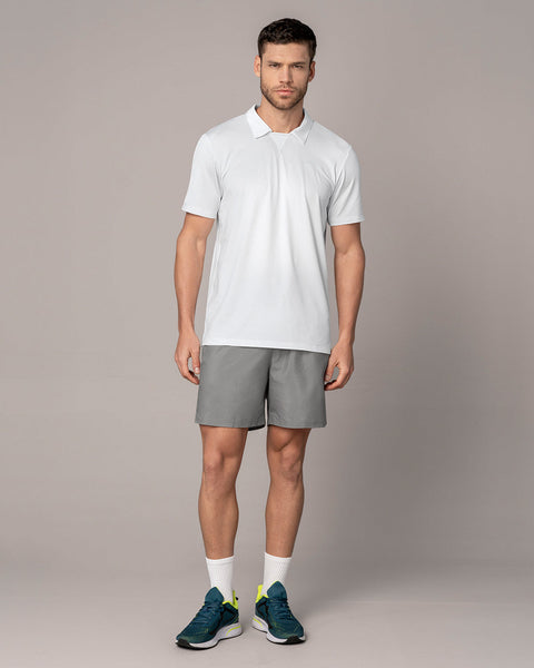 Pantaloneta deportiva con bolsillos funcionales#color_753-gris-claro