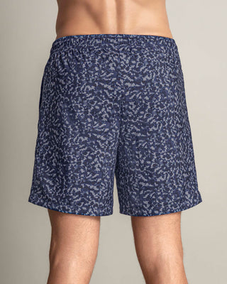 Pantaloneta deportiva con bolsillos funcionales#color_a63-estampado-animal-print