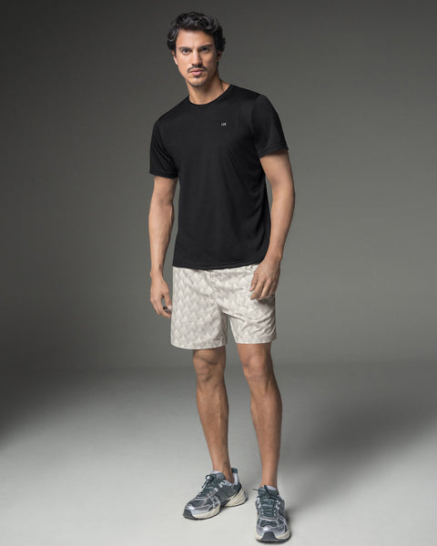 Pantaloneta deportiva con bolsillos funcionales#color_a92-marfil-estampado-triangulo