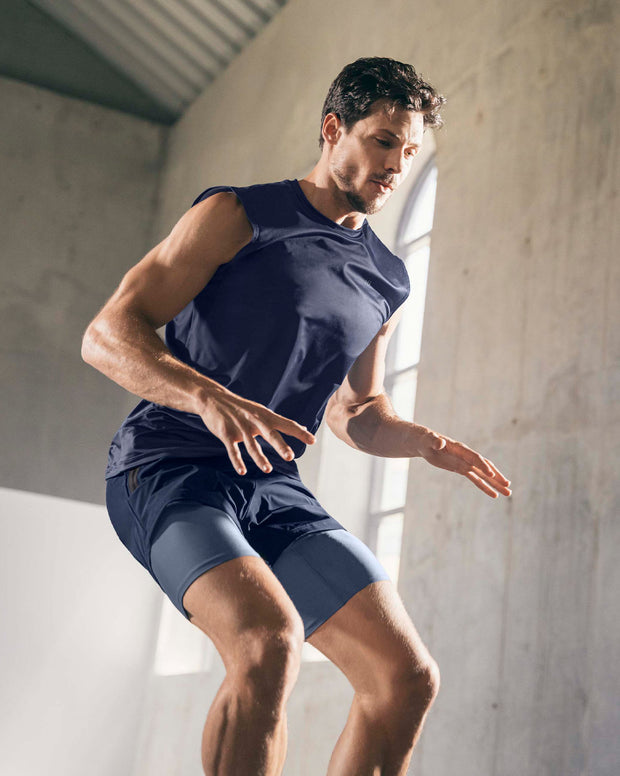 Pantaloneta deportiva con bolsillo lateral con bóxer interno