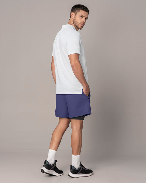 Pantaloneta deportiva con bolsillo lateral con bóxer interno#color_522-azul