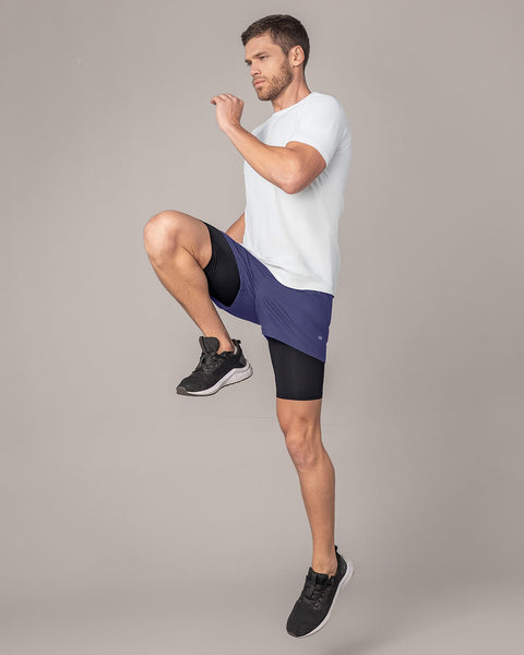 Pantaloneta deportiva con bolsillo lateral con bóxer interno#color_522-azul