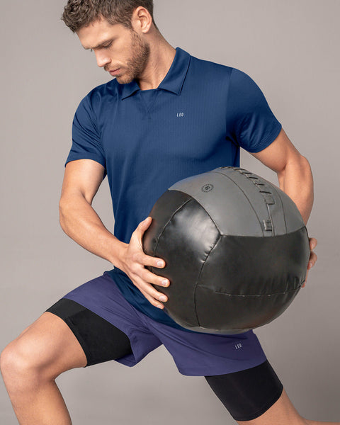 Pantaloneta deportiva con bolsillo lateral con bóxer interno#color_522-azul