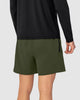 Pantaloneta deportiva con bolsillo lateral con bóxer interno#color_604-verde