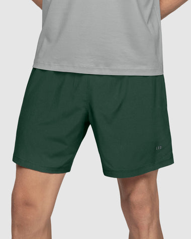 Pantaloneta deportiva con bolsillo trasero y bóxer interno#color_611-verde