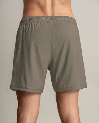 Pantaloneta deportiva con bóxer interno#color_789-arena