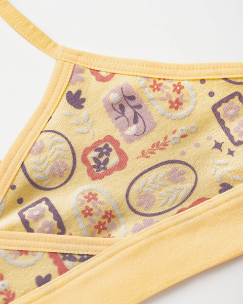 Top principiante con espalda deportiva para niña paquete x 2#color_s05-lila-amarillo-estampado-flores