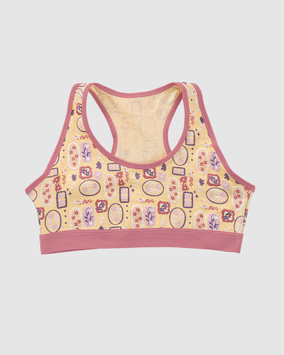 Top con espalda deportiva elaborado en algodón para niña#color_952-amarillo-estampado-flores