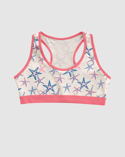 Top con espalda deportiva elaborado en algodón para niña#color_b50-marfil-estampado-estrellas