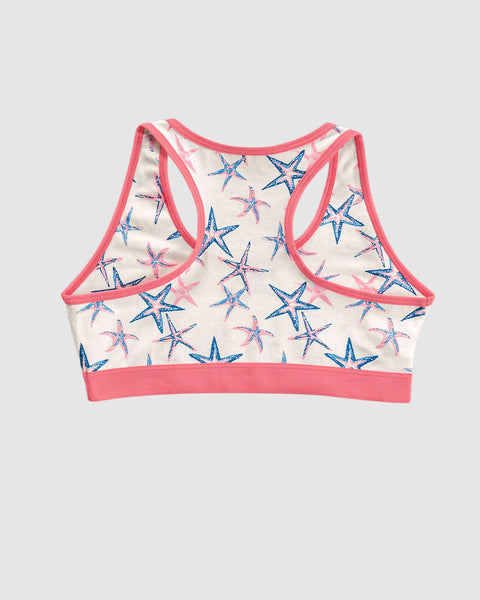 Top con espalda deportiva elaborado en algodón para niña#color_b50-marfil-estampado-estrellas