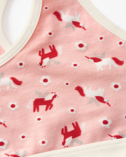 Top con espalda deportiva elaborado en algodón para niña#color_b89-fondo-rosado-estampado