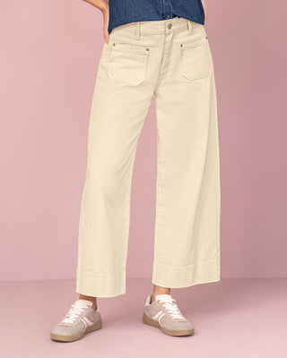 Jean bota amplia de tiro alto#color_018-marfil