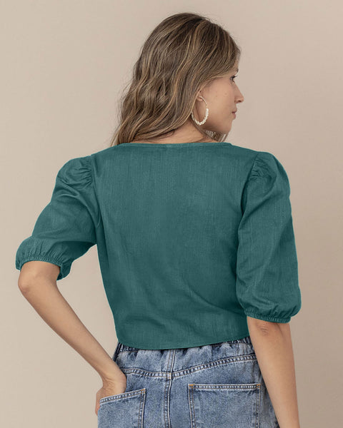 Blusa manga corta tipo crop con detalle de anudado en frente#color_063-verde-azul