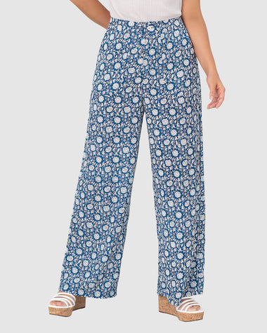 Pantalón largo tiro alto con pretina con cierre y botón funcionales#color_086-estampado-flores-azul