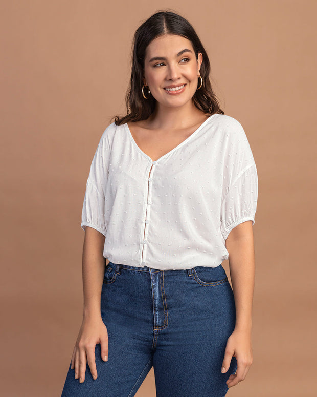 Blusa manga corta elaborada en tela con textura