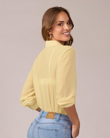 Blusa manga larga elaborada en tela con transparencia#color_c72-mantequilla