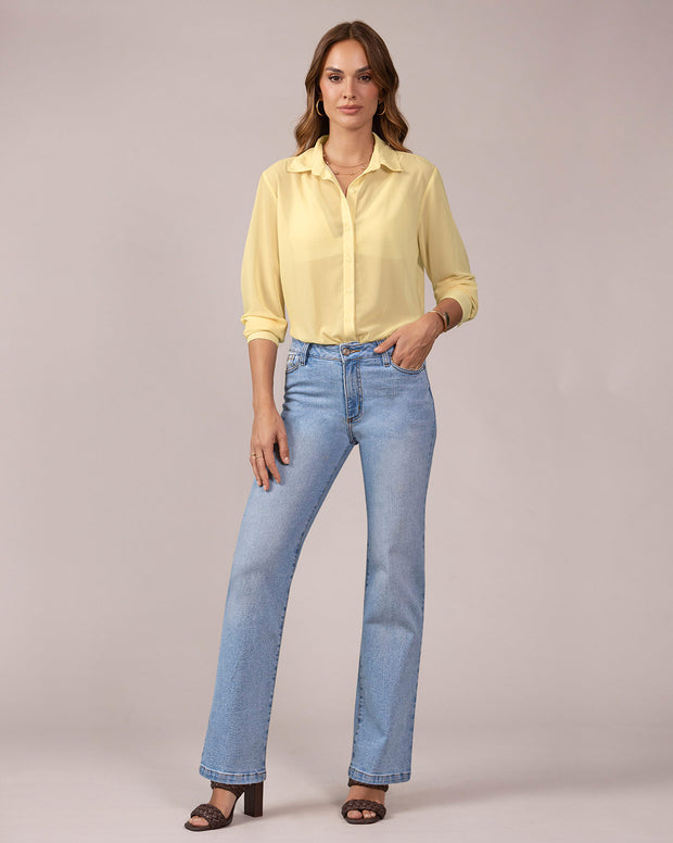 Blusa manga larga elaborada en tela con transparencia