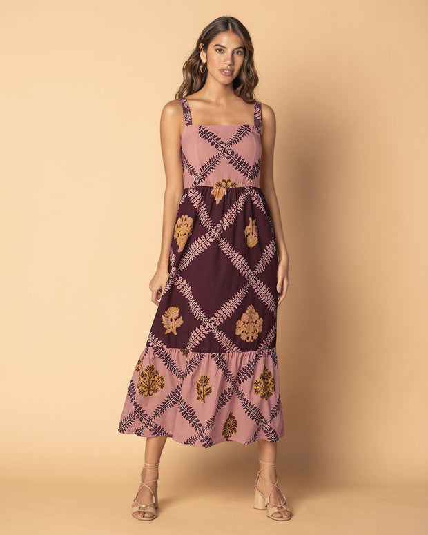 Vestido midi de tiritas y bolero en ruedo