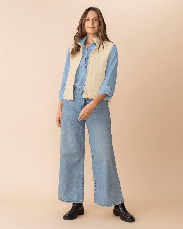 Blusa manga larga de cuello camisero con botones funcionales en frente