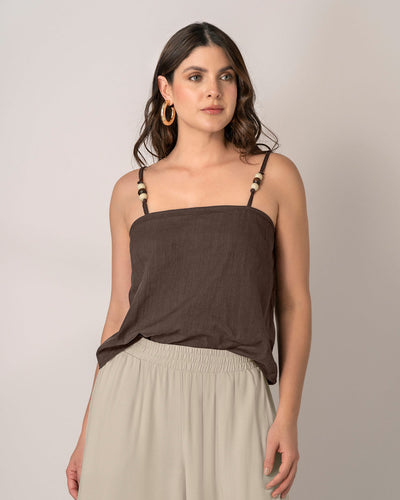 Blusa de tiritas con apliques en madera#color_800-cafe-oscuro