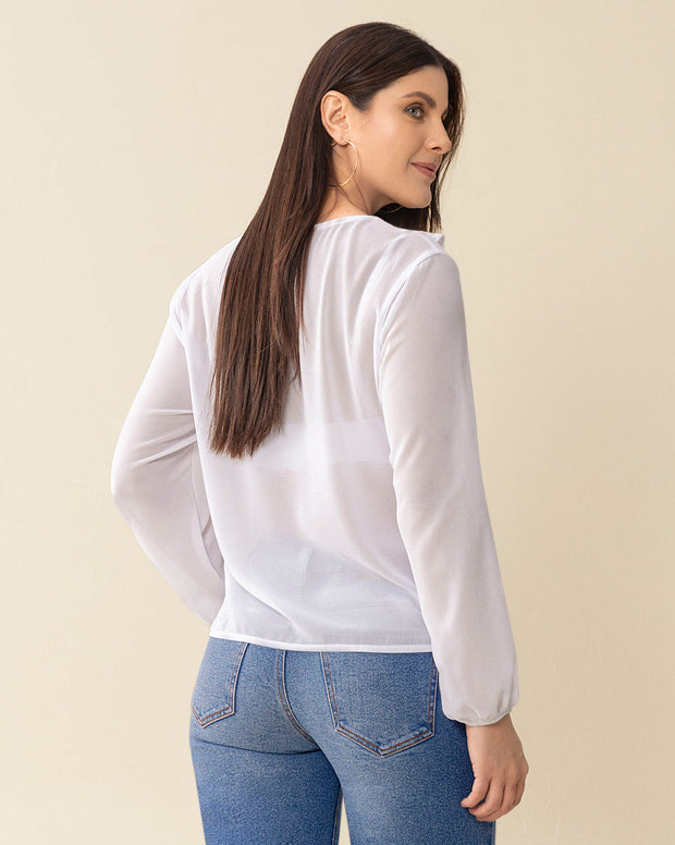 Blusa manga larga con transferencia y boleros