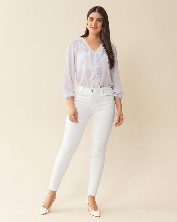 Blusa manga larga con transferencia y boleros