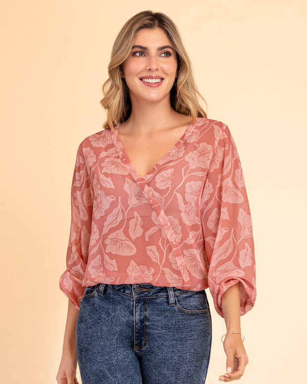 Blusa manga larga estampada con elástico en puños