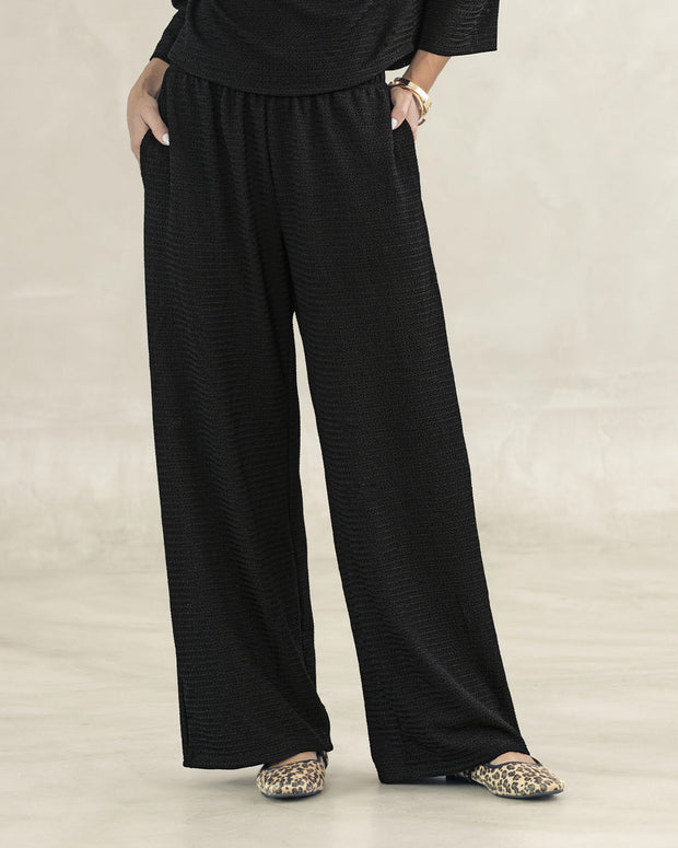 Pantalón largo en tela con textura