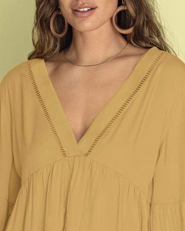 Blusa escote en V con aplique de escalerilla