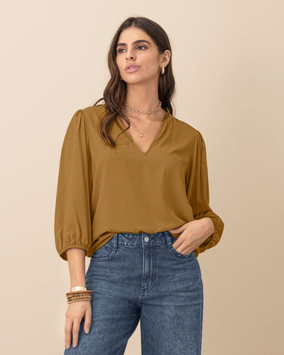 Blusa manga 3/4 con elástico en puños#color_847-mostaza