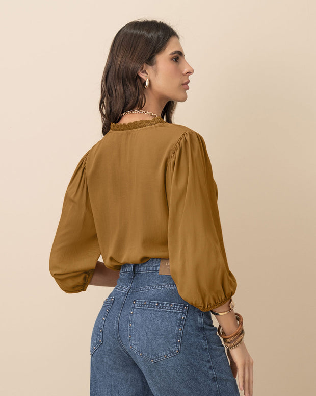 Blusa manga 3/4 con elástico en puños