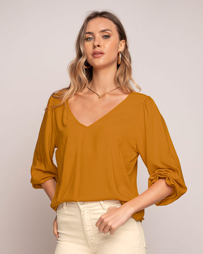 Blusa de mangas con volumen#color_847-mostaza