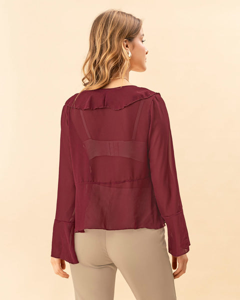 Blusa con bolero en escote en tela con transparencia#color_c55-vino