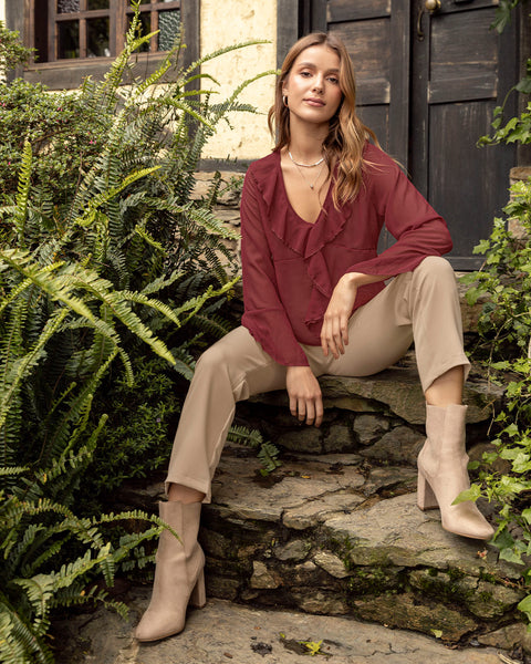 Blusa con bolero en escote en tela con transparencia#color_c55-vino
