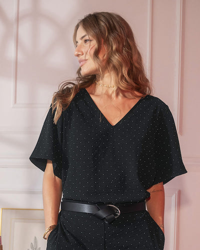 Blusa manga corta con apliques brillantes#color_700-negro