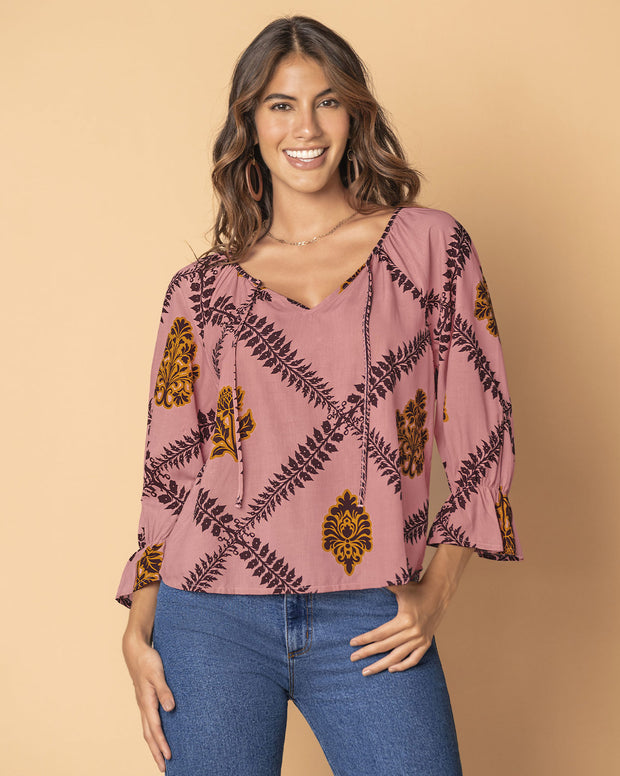 Blusa estampada manga 3/4 con elástico y bolero en puños