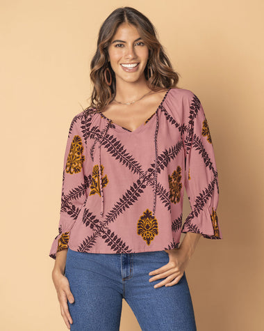Blusa estampada manga 3/4 con elástico y bolero en puños#color_145-rosa-medio-estampado
