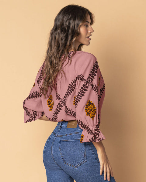 Blusa estampada manga 3/4 con elástico y bolero en puños#color_145-rosa-medio-estampado