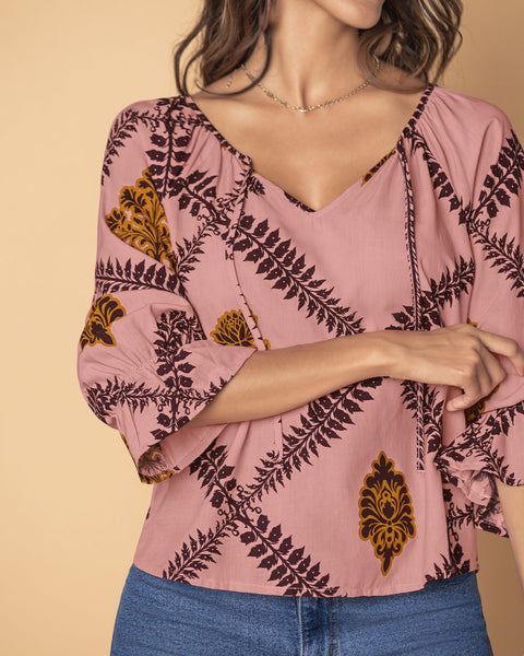 Blusa estampada manga 3/4 con elástico y bolero en puños#color_145-rosa-medio-estampado