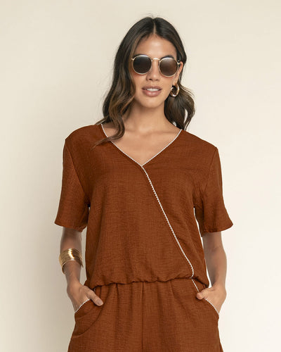 Blusa manga corta de escote en V cruzado#color_c20-terracota