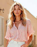 Camisa botones funcionales en frente silueta amplia#color_035-raya-rosa