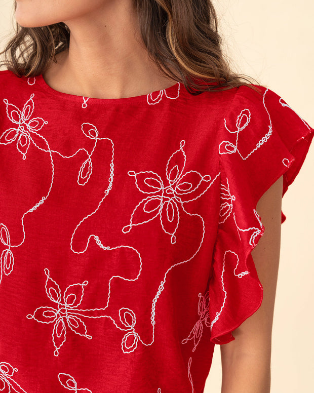 Blusa en tela bordada con bolero en mangas
