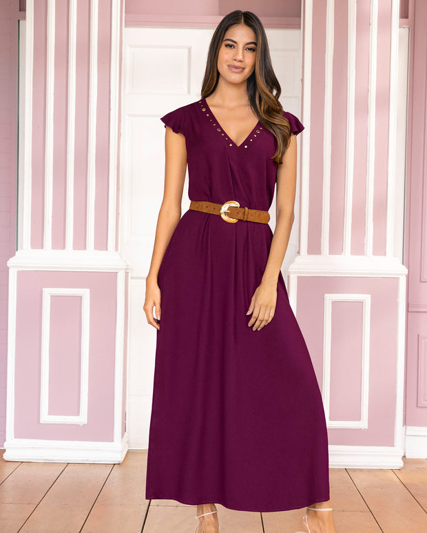 Vestido largo con taches y ojaletes metálicos